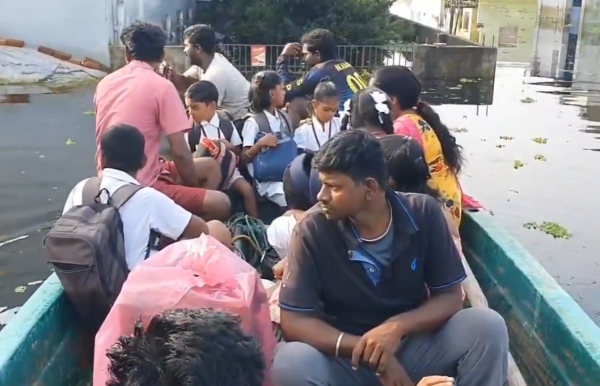 Chennai: Children are forced to go to school by boat due to waist-high standing water in Nazarathpet 