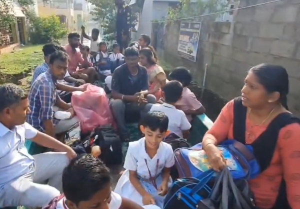 Chennai: Children are forced to go to school by boat due to waist-high standing water in Nazarathpet 