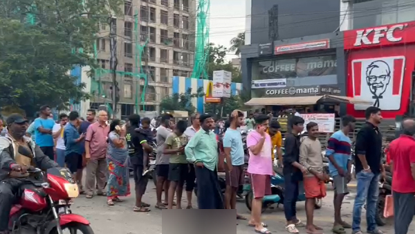 Very long queue to get milk in chennai as supply affected due to Cyclone Michaung