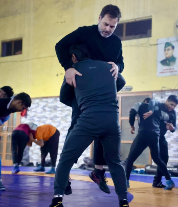 Rahul Gandhi and Bajrang Punia practising wrestling on a mat in Haryana Rahul Gandhi and Bajrang Punia practising wrestling on a mat in Haryana