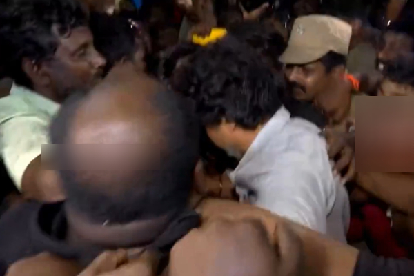 A fan kisses continuously to Actor Vijay 