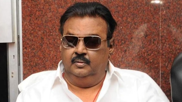Vijayakanth wore partys towel around his neck 