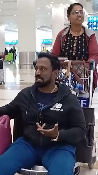 Actor Robo Shankars wife pushing Robo Shankar in a cart Actor Robo Shankars wife pushing Robo Shankar in a cart