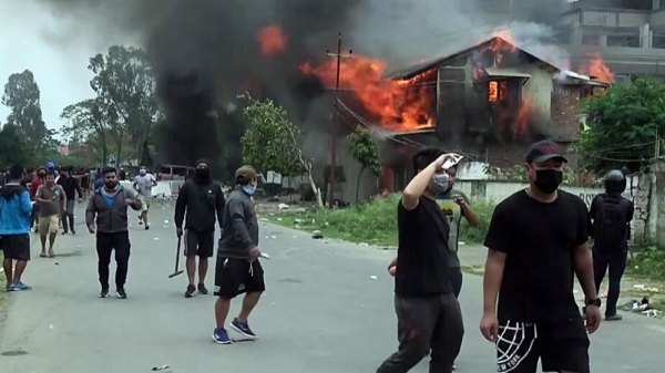 Curfew has been re-imposed in Manipur after fresh firing and clashes on New Years Evening Curfew has been re-imposed in Manipur after fresh firing and clashes on New Years Evening