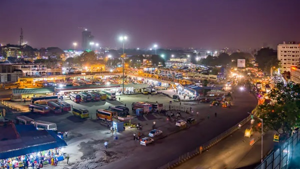 What happened to the young woman at Bangalore Gangavathi Bus Station? 
