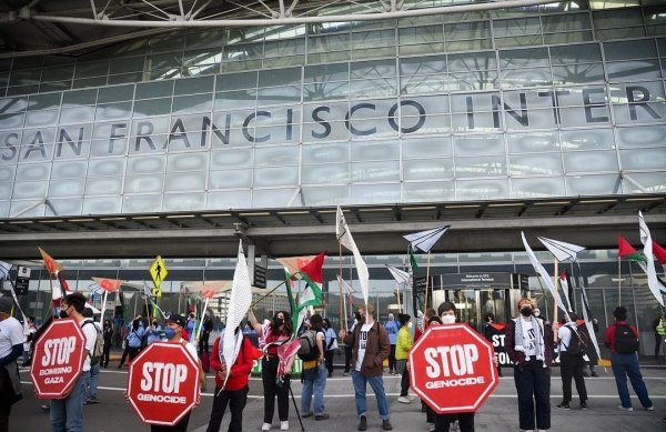 People protest at San Francisco airport demanding that the US not give arms to Israel to stop the war on Gaza