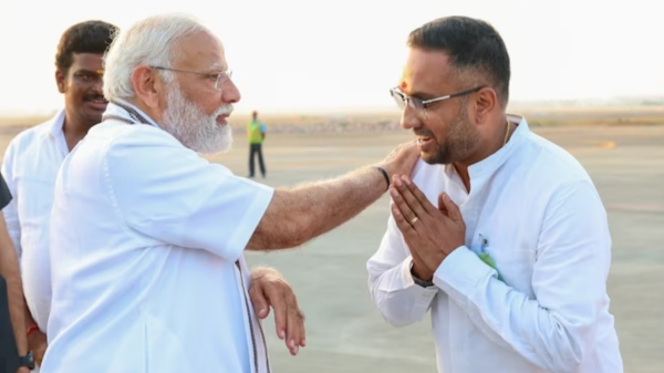 BJP worker Pijai receives PM Modi before seeing his newborn twins