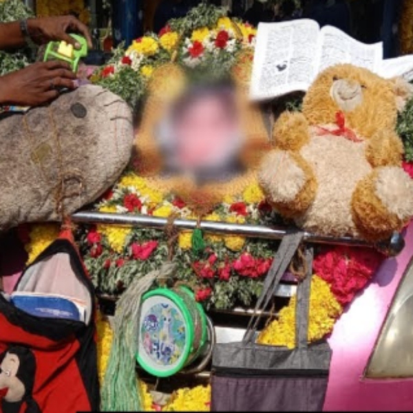 Puducherry girl funeral books bag and toys hanging on the vehicle