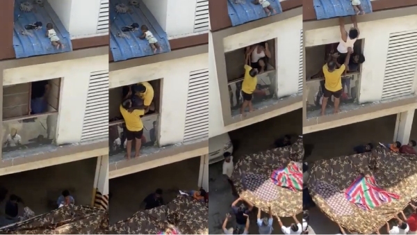 People came together to save a baby who was hanging in Chennai apartment People came together to save a baby who was hanging in Chennai apartment
