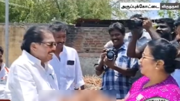 Minister KKSSR Ramachandran shakes hands with BJP candidate Radhika and says congrats Minister KKSSR Ramachandran shakes hands with BJP candidate Radhika and says congrats