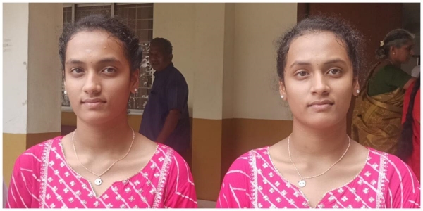 Two twin sisters have scored same marks in the 10th examination result Two twin sisters have scored same marks in the 10th examination result