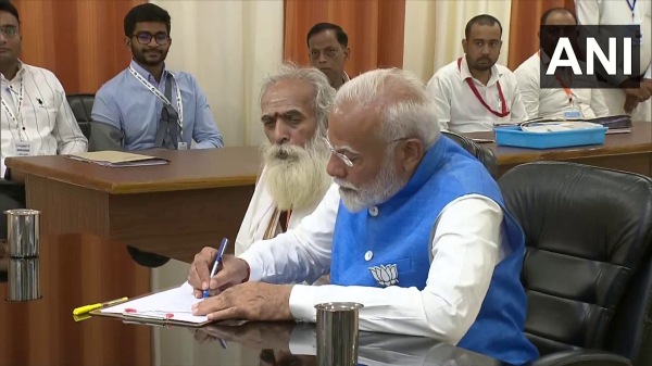 PM Modi files nomination before district magistrate Tamilian Rajalingam