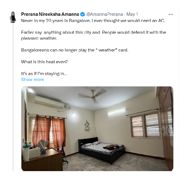 A woman explains the heat of Bangalore city by showing the AC installed in her bedroom
