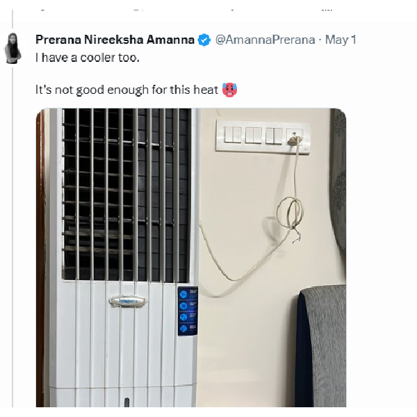 A woman explains the heat of Bangalore city by showing the AC installed in her bedroom