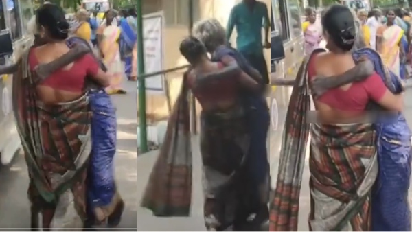 Daughter carrying his old mother in erode government hospital after denied stretcher