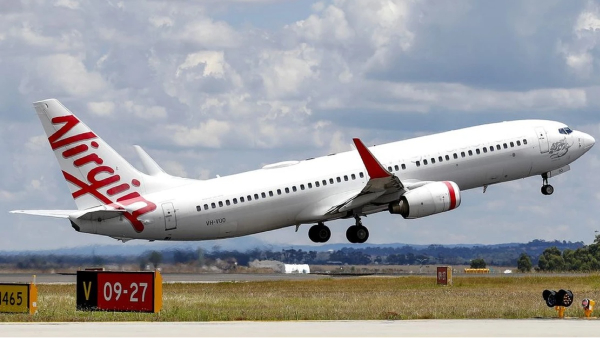 Passengers shocked by man who runs naked on plane in Australia