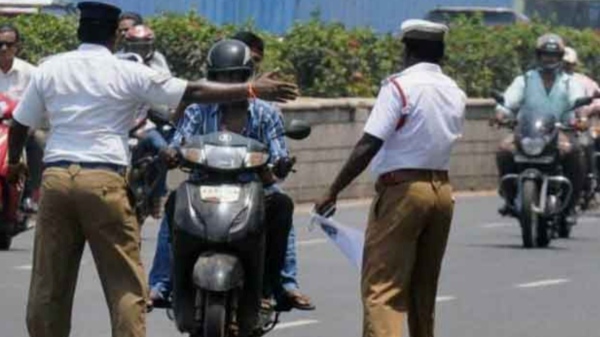 If a sticker put on the number plate of private vehicles fine will be imposed from today says chennai police