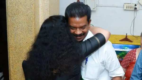 An IAS officer politician s hug goes trending in kerala