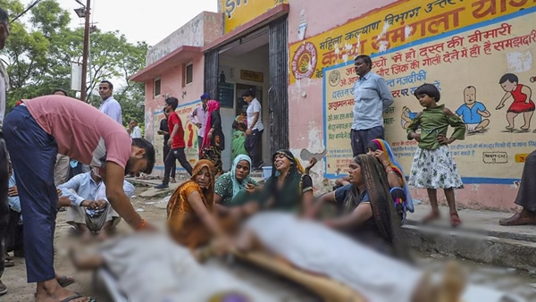 Hathras stampede Outside hospital bodies of stampede victims lay on the floor