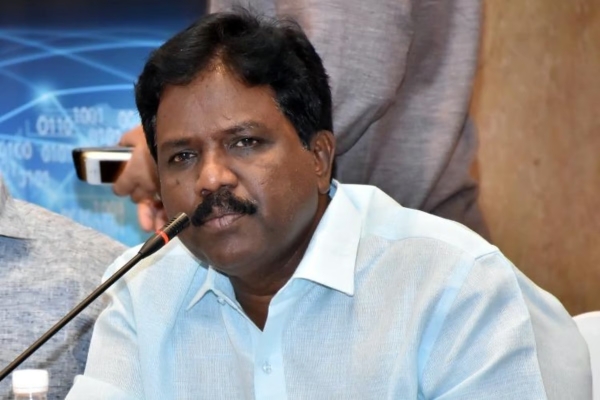 government employee scheduled caste Ravikumar