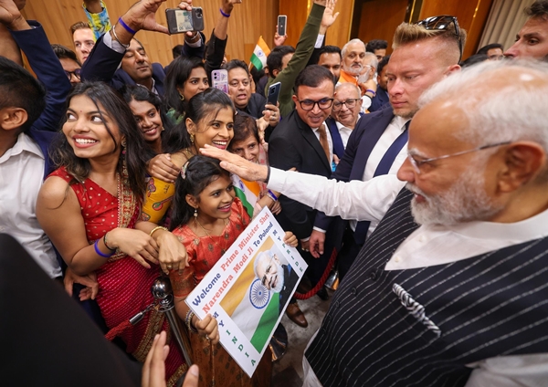 Prime Minister Narendra Modi addresses Indian diaspora at a social event in Warsaw Poland