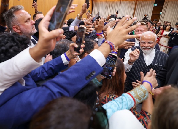 Prime Minister Narendra Modi addresses Indian diaspora at a social event in Warsaw Poland