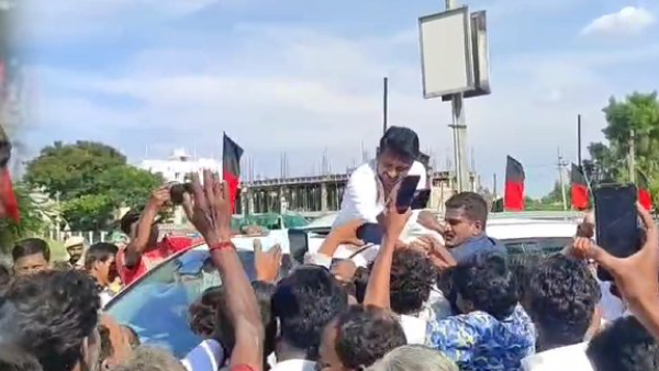 Udhayanidhi Stalin Arrives in Coimbatore Amid Warm Reception Camps as Vijay Attends TVK Seminar Udhayanidhi Stalin Arrives in Coimbatore Amid Warm Reception Camps as Vijay Attends TVK Seminar