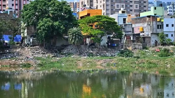 Demolition of houses on the banks of the Adyar river in Pallavaram Anakaputhur Chennai