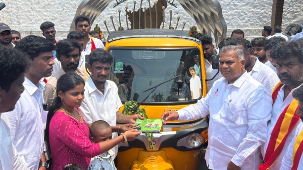 TVK General Secretary Bussy Anand cut his photo which is presented in a Auto with vijay