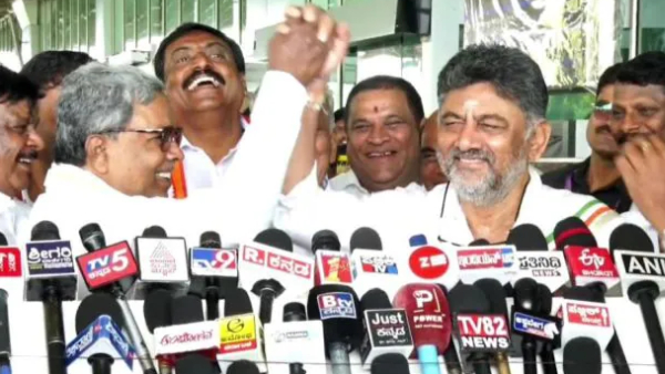 Karnataka CM Siddaramaiah Dismisses Rift Rumours Joins Hands with DK Shivakumar