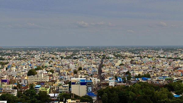 Why did Trichy Consumer Court fine a company 27 4 lakh for delay in house construction work