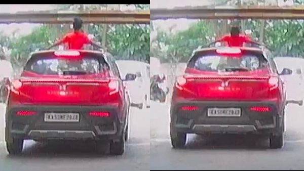 the-boy-head-collided-with-overhead-barrier-in-bengaluru-when-he-head-out-of-car-sunroof the-boy-head-collided-with-overhead-barrier-in-bengaluru-when-he-head-out-of-car-sunroof