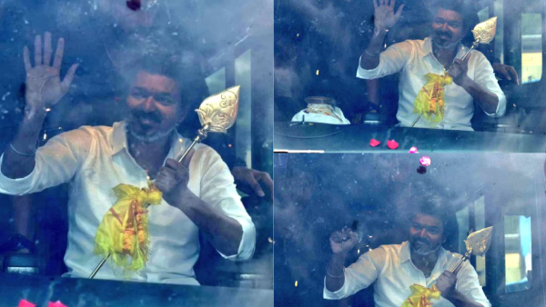 TVK Vijay Receives Murugan Vel and Periyar Portrait from Cadres During Trichy Tour TVK Vijay Receives Murugan Vel and Periyar Portrait from Cadres During Trichy Tour