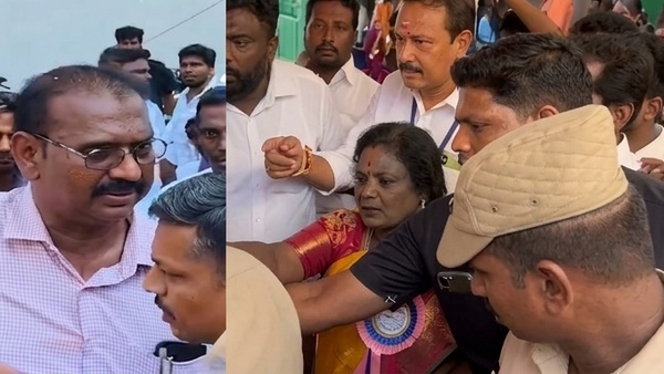 a-man-trying-to-attack-tamilisai-soundararajan-at-myloapore-booth-in-chennai a-man-trying-to-attack-tamilisai-soundararajan-at-myloapore-booth-in-chennai
