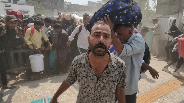 Gujarat Surat LPG Migrant Workers Exodus Surat LPG Shortage Surat Surat Udhna Railway Station Rush Industrial Slowdown Gujarat Migrant Workers Protest India migrant workers leaving surat surat udhna railway station crowd lpg shortage surat migrant workers industrial slowdown gujarat workers return home rohit paswan surat lpg shortage jaihind maurya surat train rush west asia conflict impact on indian lpg noida panipat worker protests minimum wage protests haryana gujarat new labour codes dissatisfaction rising living costs migrant workers surat steel project protest panipat refinery workers clash bihar up workers exodus from gujarat india migrant workforce crisis 2026