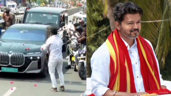 Fan Frenzy for Vijay Cadre Showers Flowers on TVK Leader s Car at Signa
