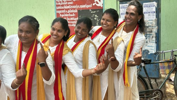 Tamil Nadu Assembly Election 2026 Tamil Nadu Election 2026 DMK TVK Vijay Trichy election 2026 white shirt khaki pants Vijay TVK style trend TVK supporters white shirt khaki pants Trichy East polling booth Vijay outfit Srirangam Vijay style attire Tamil Nadu election Vijay dress code young voters TVK white shirt women voters khaki pants Trichy transgender woman TVK outfit Thalapathy Vijay campaign attire Tamilaga Vettri Kazhagam voting trend Trichy voting day fashion Vijay signature look election 2026 TVK unity through dressing Tamil Nadu polls white khaki combination 2026 2026 Tamil Nadu Assembly Election 2026 Tamil Nadu Election 2026 DMK TVK Vijay Trichy election 2026 white shirt khaki pants Vijay TVK style trend TVK supporters white shirt khaki pants Trichy East polling booth Vijay outfit Srirangam Vijay style attire Tamil Nadu election Vijay dress code young voters TVK white shirt women voters khaki pants Trichy transgender woman TVK outfit Thalapathy Vijay campaign attire Tamilaga Vettri Kazhagam voting trend Trichy voting day fashion Vijay signature look election 2026 TVK unity through dressing Tamil Nadu polls white khaki combination 2026 2026