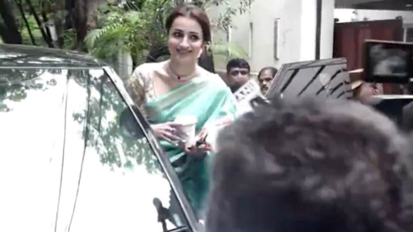 Trisha Krishnan Thalapathy Vijay TVK CM Oath Ceremony Blue Saree Jasmine Flowers Chennai