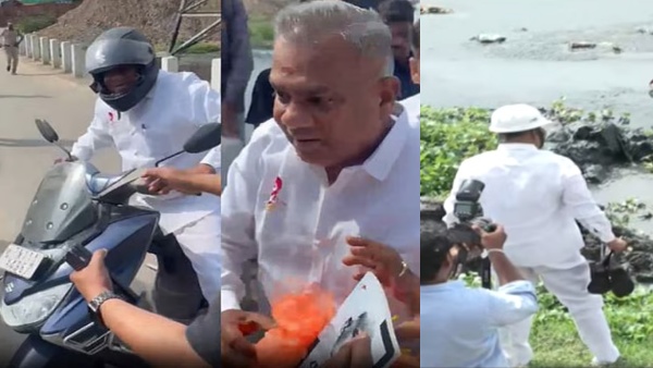 Bussy Anand arrives by bike to inspect the Cooum River at Chennai Padikuppam after getting stuck in traffic Bussy Anand arrives by bike to inspect the Cooum River at Chennai Padikuppam after getting stuck in traffic