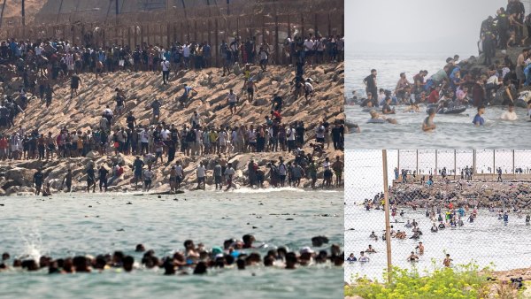 Morocco thousands of people swimming across the sea to enter Spain