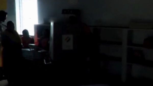 Dharapuram By-Election Power Cut at Polling Station Voters Cast Votes Using Flashlights Dharapuram By-Election Power Cut at Polling Station Voters Cast Votes Using Flashlights