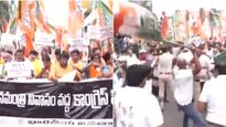 విజయవాడ వీధుల్లో రణరంగం: తన్నుకున్న కాంగ్రెస్, బీజేపీ నాయకులు- కర్రలు, బాహాబాహి
