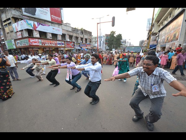 ఆసనాలు వేస్తూ...