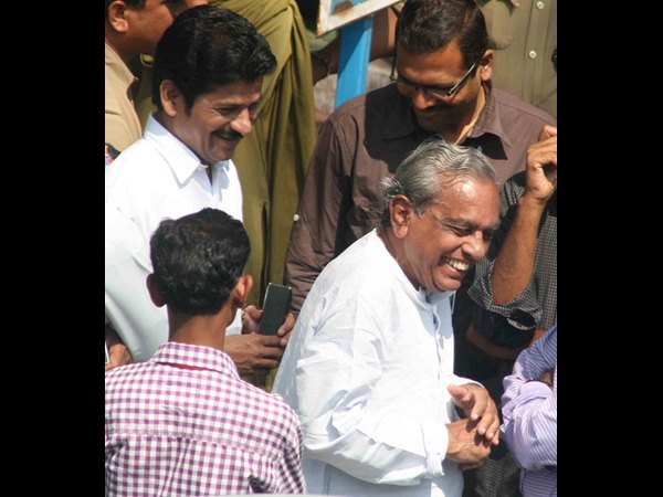 రేవంత్ రెడ్డి, గాదె నవ్వుతూ..