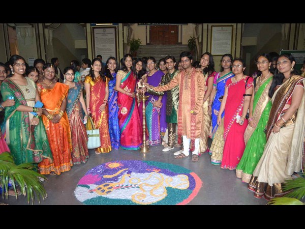 జ్యోతి ప్రజ్వలన చేస్తూ.. 