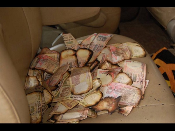కాలిన నోట్లు ఇలా...
