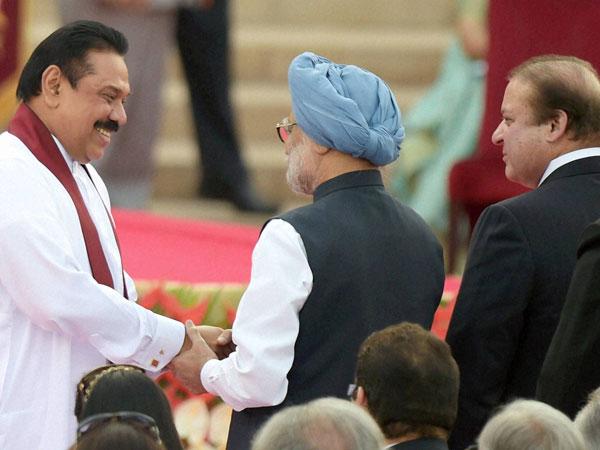 మన్మోహన్‌తో రాజపక్ష