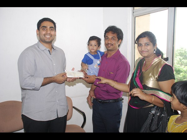 లోకేష్ చేతికి చెక్కులు