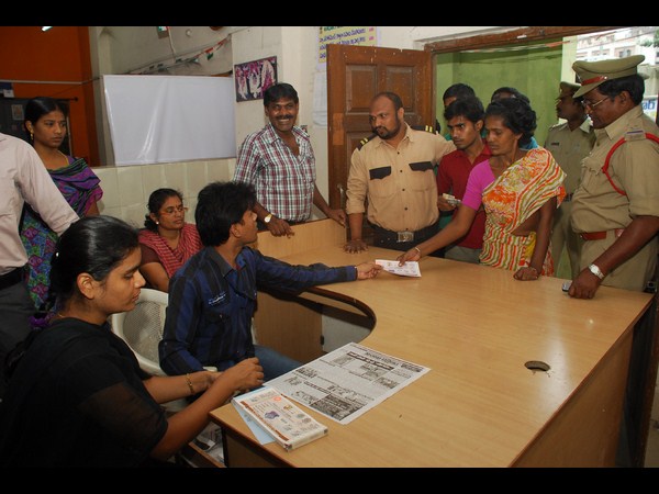 టికెట్ కొనుగోలు చేస్తూ..