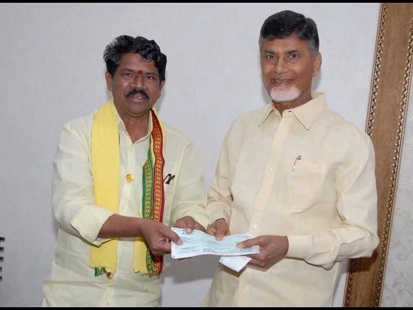 బాబుకు చెక్కు